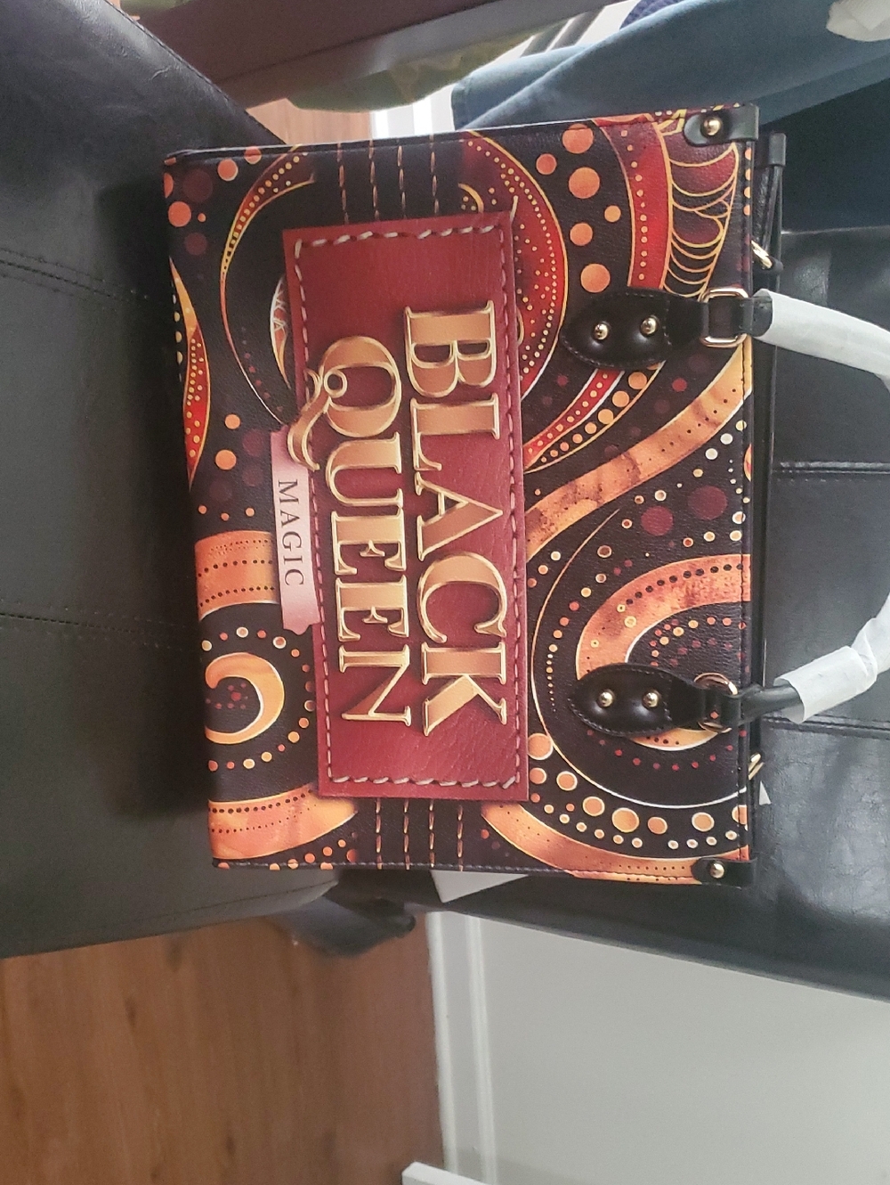 Black Queen Magic Statement Handbag in Black & Copper